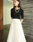 VOLUME SLIT FLARE SKIRT